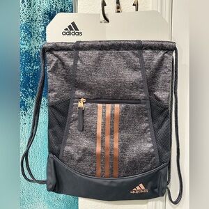 adidas Men’s Gray Drawstring Backpack with Copper Stripe Accents